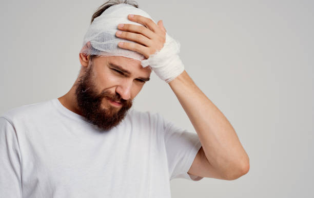istock patient with bandaged head health problems discontent trauma center 2150082586