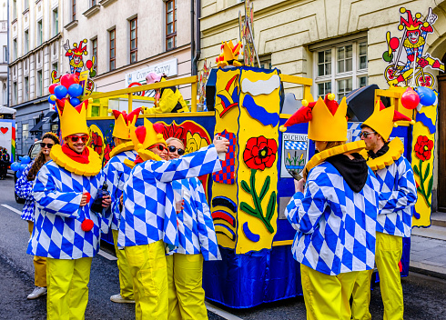 Ulm, Germany - January 29, 2023: Festival participants dressed up in handmade costume and mask at the Ulmzug carnival event.