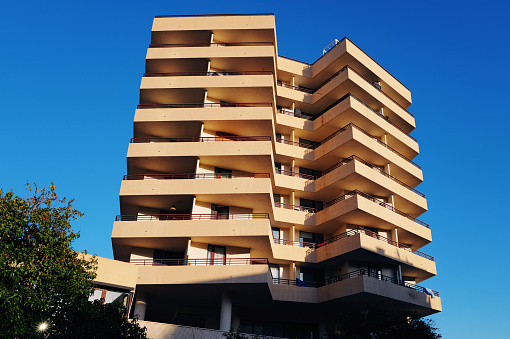 Modern Architecture Apartment Building in Downtown Palma from below against clear blue sky. Urban Street View Palma Downtown, Mallorca Island, Balearic Islands, Catalonia, Spain, Europe