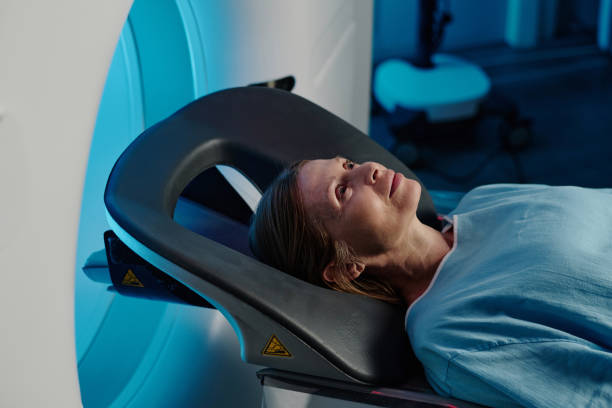istock Mature Woman Lying On CT Scanner Bed 2150086308