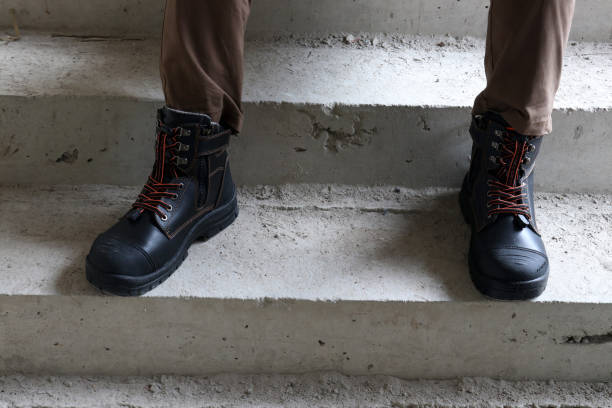 istock A construction worker wears brown leather boots which look very cool 2150087977
