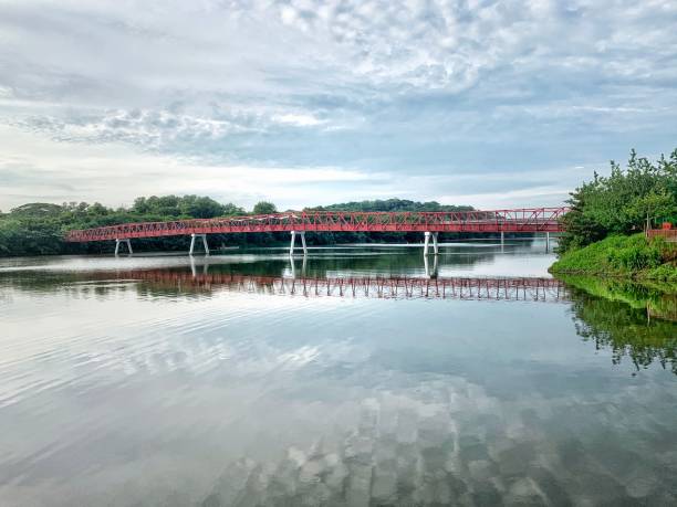 istock Reflection of red bridge at park 2150088638