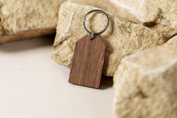 istock Branded wooden keychain with ring mockup. 3D rendering 2150090279