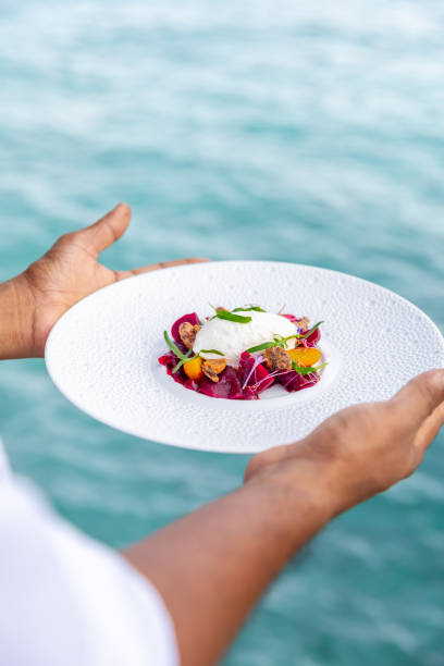 istock Gourmet appetizer dish with beetroot vegetables and whipped goat cheese  in Maldives Fine Dining Restaurant with plate by the sea 2150090769