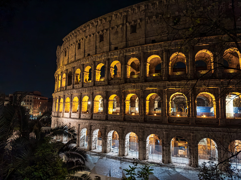 View of the Roman Colosseum illuminated at night