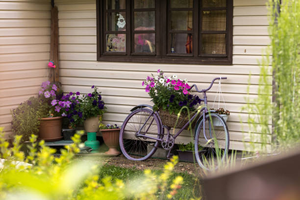 istock Bicycle with flowers as an element of landscape design 2150092959