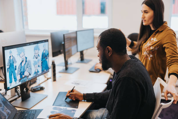Two gaming designers, working on a new video game