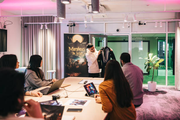 istock Indian VR gaming designer, presenting new gaming suit to his team 2150096621