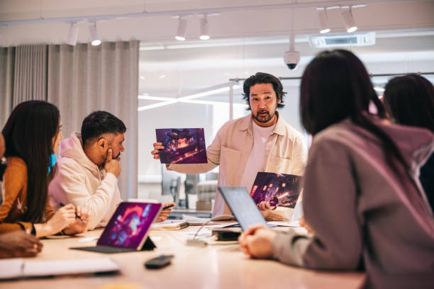 Diverse group of gaming designers working together on a new virtual game