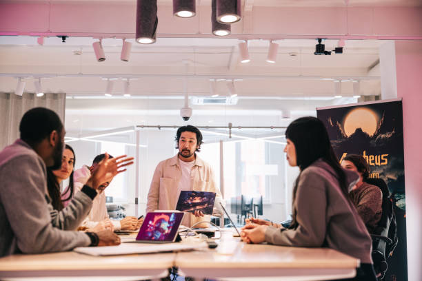 Diverse group of gaming designers working together on a new virtual game