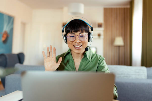 istock Waving at the Laptop 2150098366