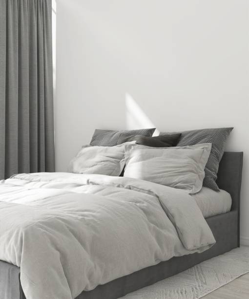 istock Modern, minimal, cozy white bedroom with gray bed on laminated parquet floor in sunlight from window with sheer curtain 2150101111
