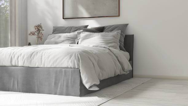 istock Modern, minimal, cozy white bedroom with gray bed on laminated parquet floor in sunlight from window with sheer curtain 2150101156