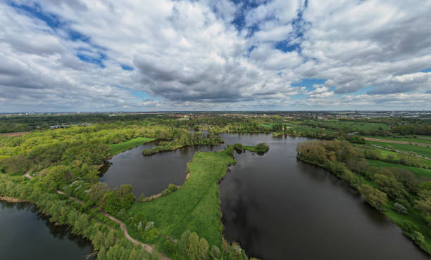 istock A tranquil lake nestled among trees and grass under a cloudy sky in Hanover 2150101699