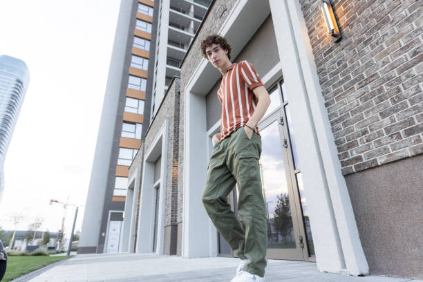istock Low angle view of a young man on the street 2150103404
