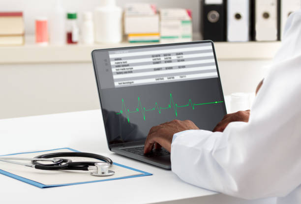istock Cardiologist working with laptop at office 2150105284