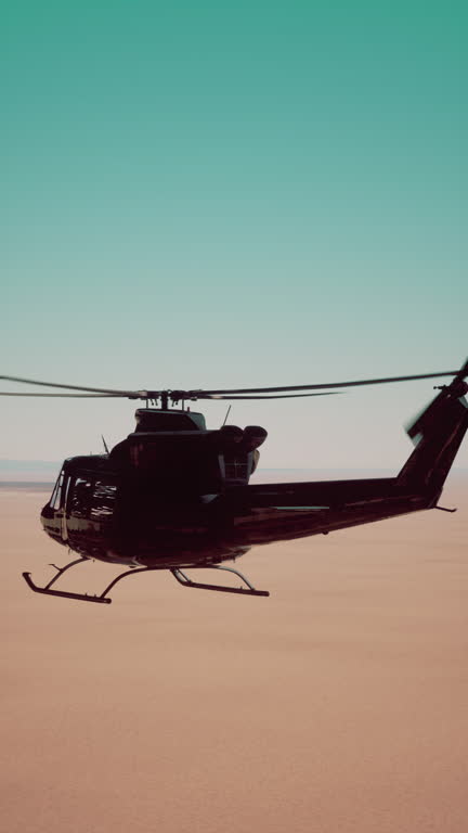 Retro American Military Helicopter Flying Over Desert