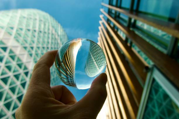 istock Crystal ball against skyscrapers 2150108596