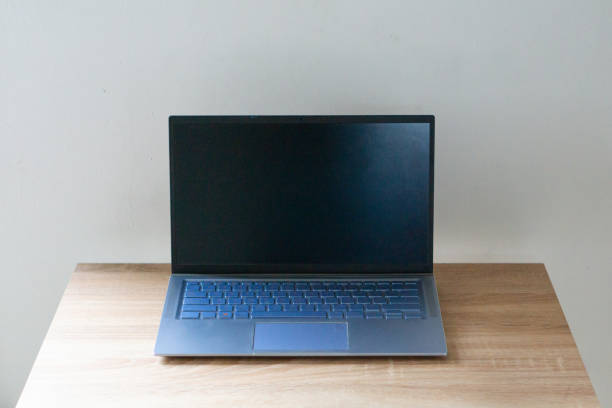 istock Laptop mockup on wooden table. Laptop with blank screen. 2150109024