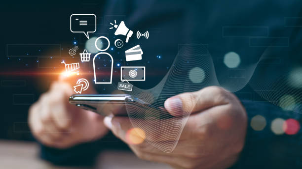 istock Digital Marketing Media Technology Graphic Concept, Business Lead And Customer Generation Magnet Pulling Figures, Businessman using mobile smart phone 2150109094