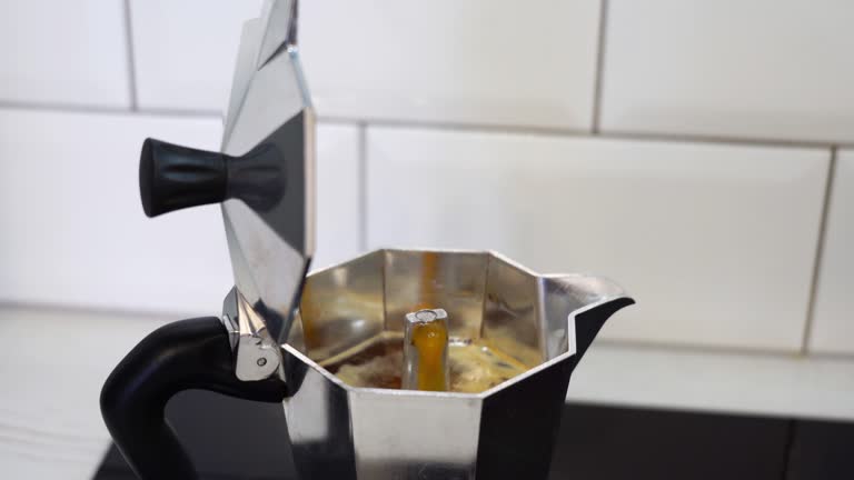 The process of making coffee in a geyser coffee maker, espresso pot, close-up view. video.