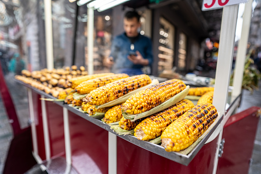 grilled corns are ready to sell close up horizontal still