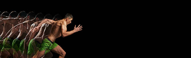istock Athletic, muscular man, runner in motion, training, running against black background with stroboscope effect 2150111846