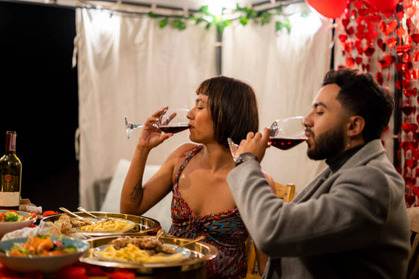istock Couple celebrating their anniversary with a romantic dinner 2150113231