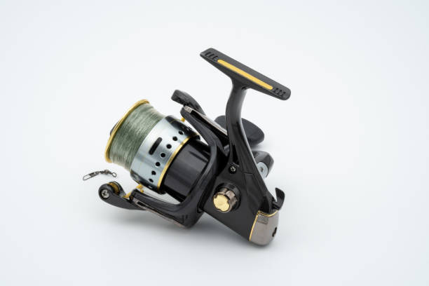 istock Spinning Fishing Reel in White Background 2150114418