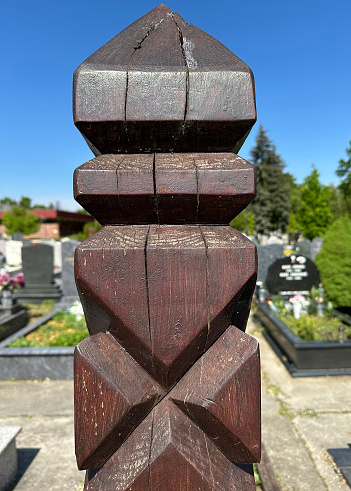 Wooden tombstone in the public cemetery