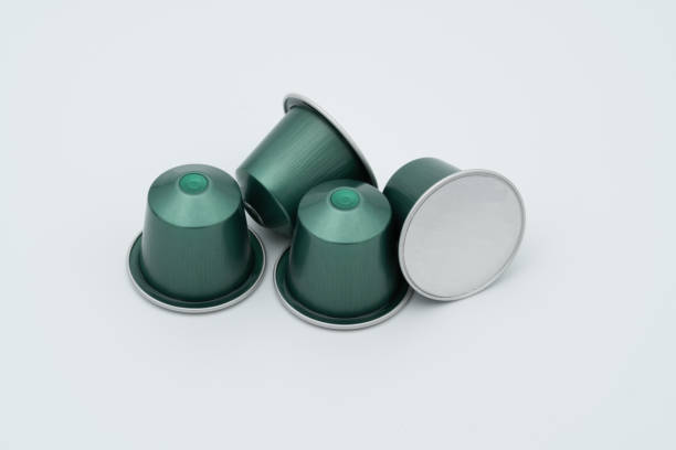 Espresso Capsules in White Background .