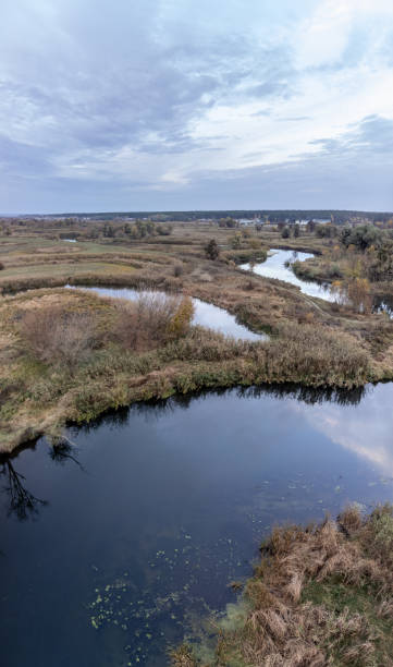 istock Aerial river valley with autumn trees 2150117265