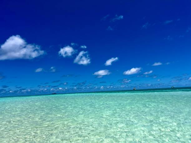 istock Pristine ocean lagoon sunny cloudy sky, idyllic relaxing seascape 2150117759