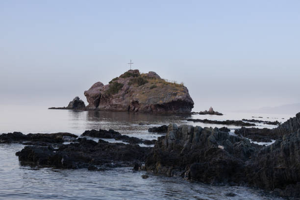 istock Aphrodite's Beach Rock with Cross, Cyprus 2150119098