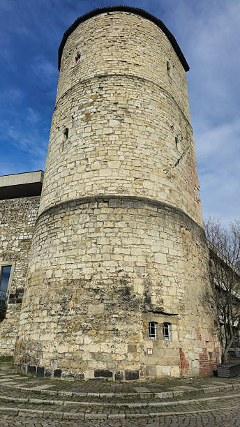 Medieval tower with brickwork and stairs rising towards the sky Hanover Germany