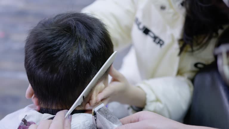 On the second day of the second lunar month in the Chinese calendar, a child is getting a haircut