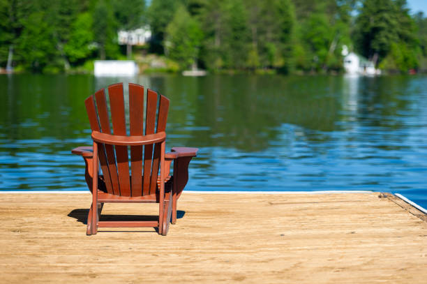 istock Adirondack chair on a Muskoka jetty 2150125848