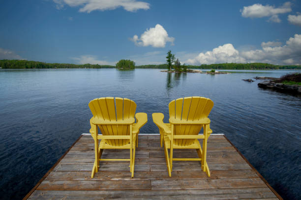 istock Muskoka Mornings with Adirondack Chairs 2150125874