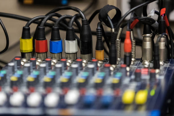 istock Audio wire plugs plugged into the audio mixing console 2150127755