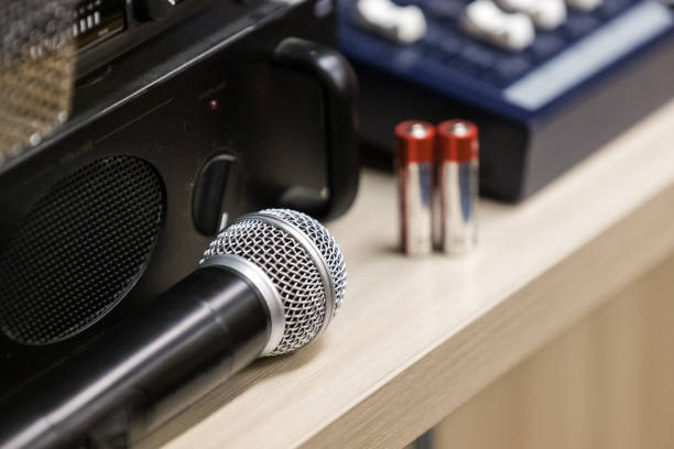 istock Microphone on the background of sound equipment 2150128191