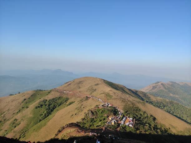 View of mountainous landscape from high vantage point.