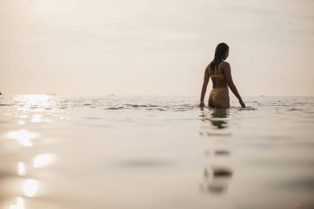 istock Young woman at the sea 2150132456