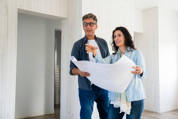 istock Couple assessing ideas for home renovations 2150136210