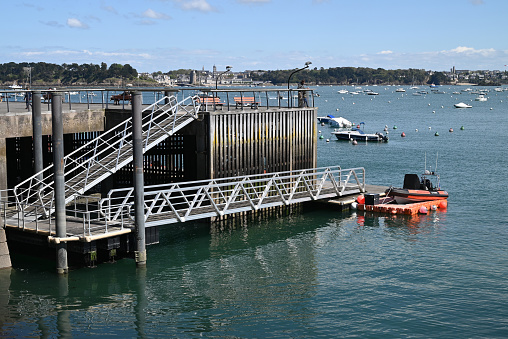 Footbridge and floating dike of the Dinard marina