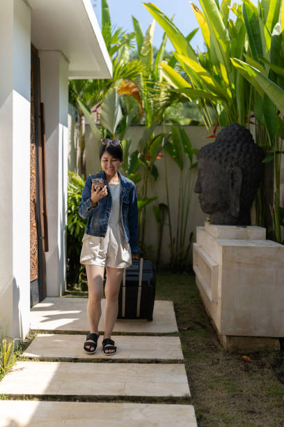istock Female Traveler Check-in To A Villa 2150143729