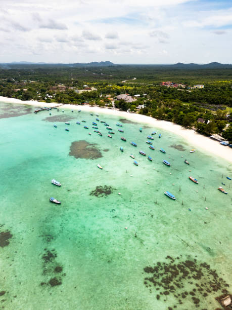istock Belitung Kelayang beach and boats drone view 2150145235