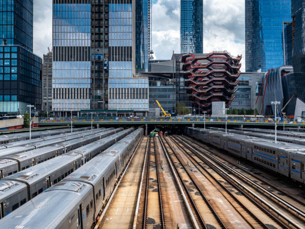 New YorkNew YorkNew YorkNew YorkTrains Wait at Hudson Yards, high line. The Hudson Yards subway storage yard area of Manhattan, in the foreground are the subway trains stored at the yard. This is visible from High Line Park and this image is taken from public footpath leading from the park.