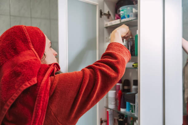 istock Man in bathrobe starting his beauty regime 2150150021