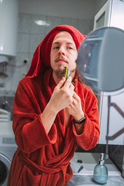 istock Using an electric shaver to trim my mustache 2150150215