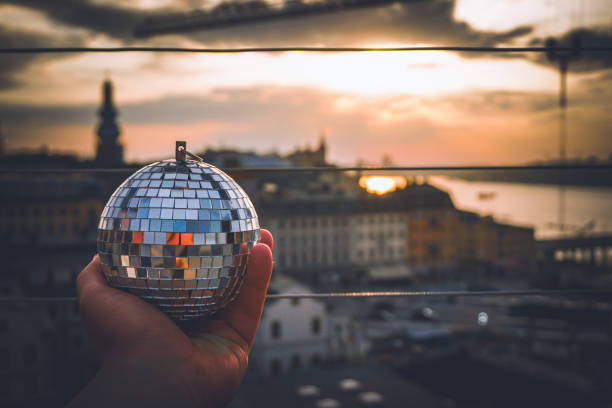 istock Cropped hand holding a disco ball outdoors 2150150468